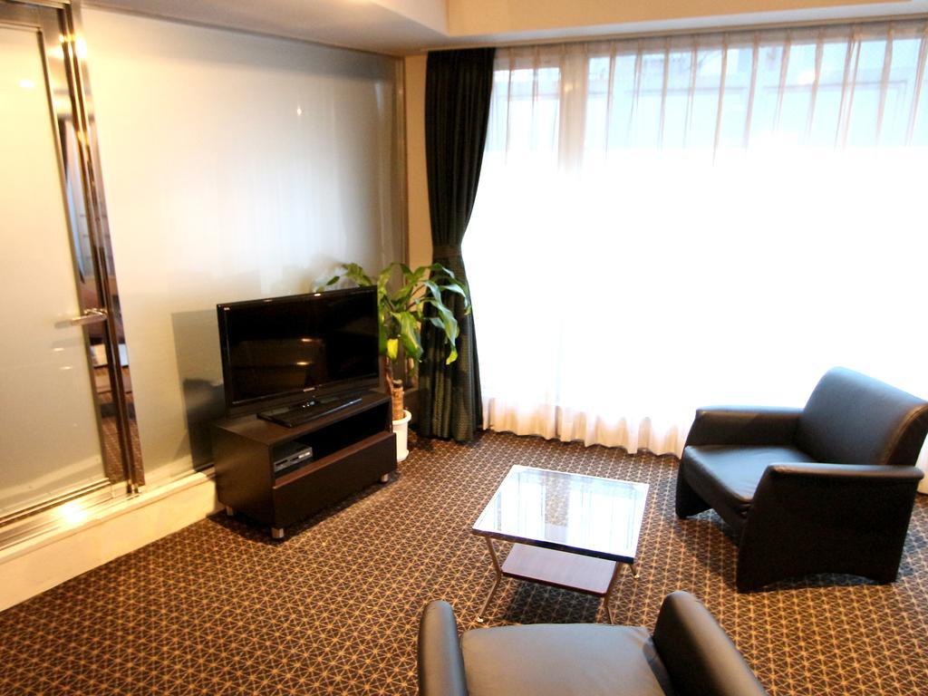 Hotel Livemax Budget Korakuen Токио Стая снимка